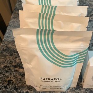 Nutrafol 3 packs of 120 pills woman’s formula.